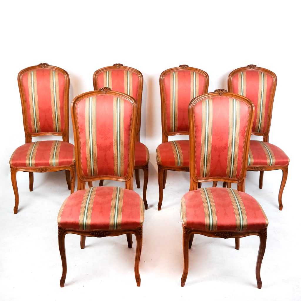 Six Louis XV-Style Dining Chairs: Six (6) Louis XVI-style side chairs with floral carved frames. [44" H x 20 1/2" W x 22 1/2" D]. Condition reports and requests for additional photos cannot be accepted on this lot, please bid accordin