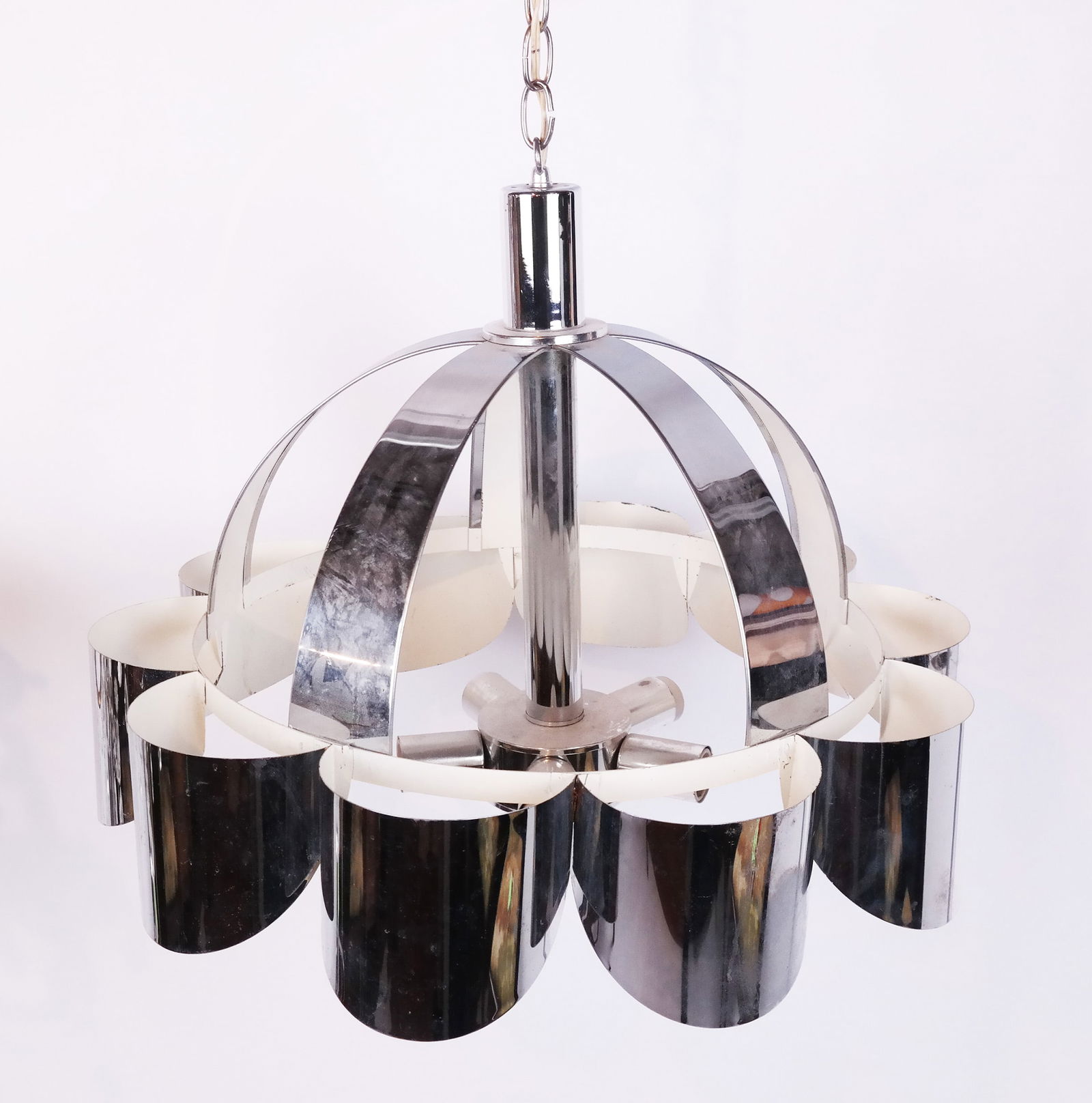 Mid-Century Modern Chrome Chandelier: Mid-century modern chrome chandelier with Space Age reflective panels around five lights, in the manner of Reggiani Sciolari or Max Sauze, unmarked. [16" H x 23" Diam.]. Condition reports and requests