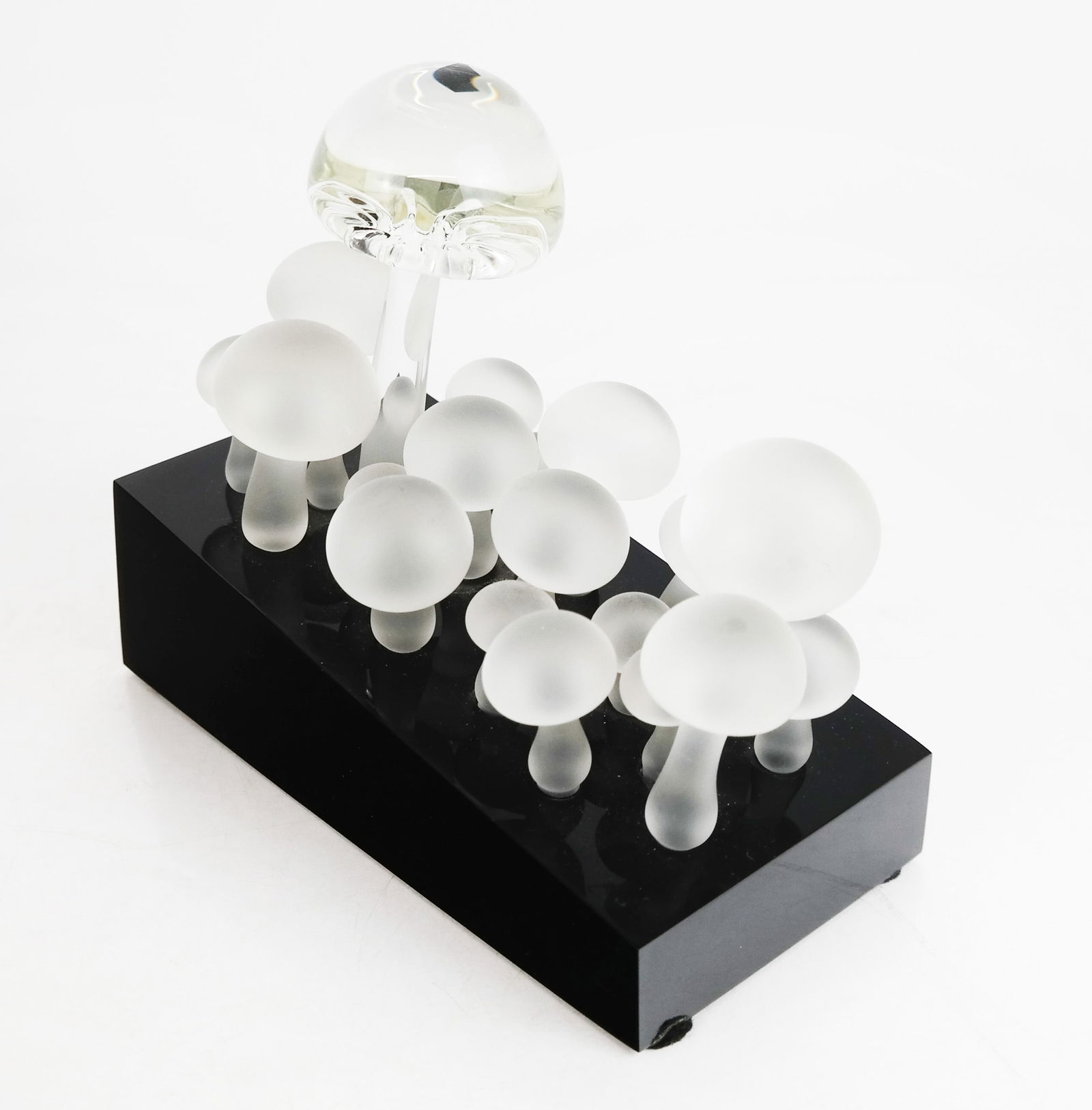 Guyol for Cartier Glass Sculpture: Clear and frosted glass mushrooms sculpture on a black acrylic base, signed to base, by Guyol for Cartier. [Overall: *" H x 8 3/8" W x 4" D]. Condition reports and requests for additional photos canno