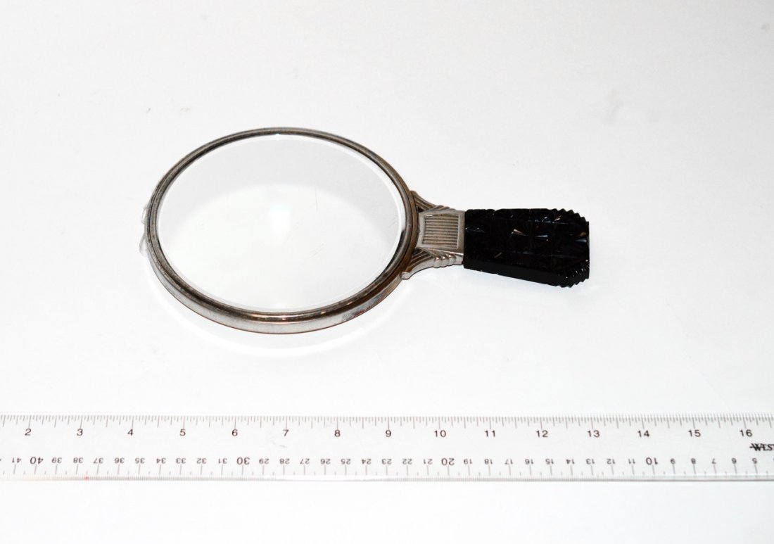 Deco Silver Plate & Glass Mirror: Silver-plated Art Deco-style mirror having a cut glass handle. Wear to silver plate, overall in good condition.