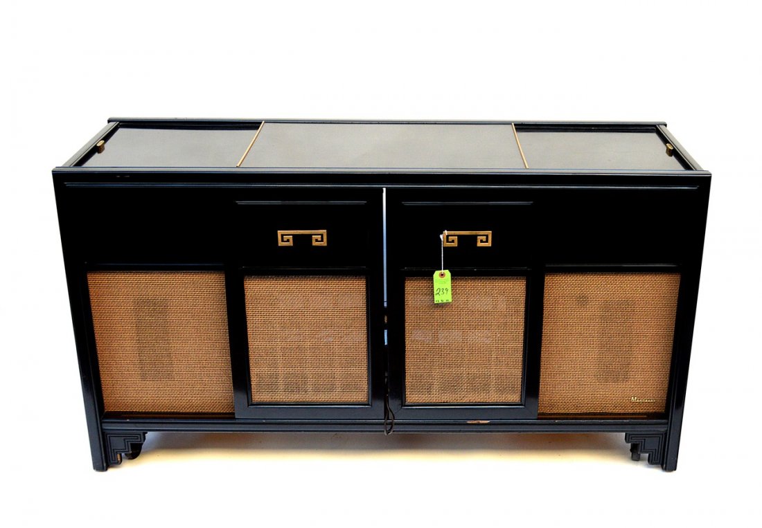 James Mont Style Black Cabinet: Made as a stereo cabinet, black laquered brass motif. 60" L x 18 3/4" D x 32 1/2" H