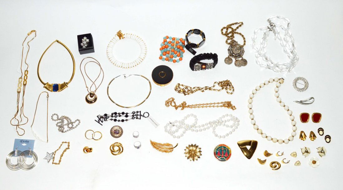 Assorted Designer Costume Jewelry: Modern and contemporary necklaces, bracelets, rings, compact, pins, brooches, and others. Designers include Trifari, Lisner, Givenchy, Adrienne Vittadint, Park Lane and others. 40+ items.