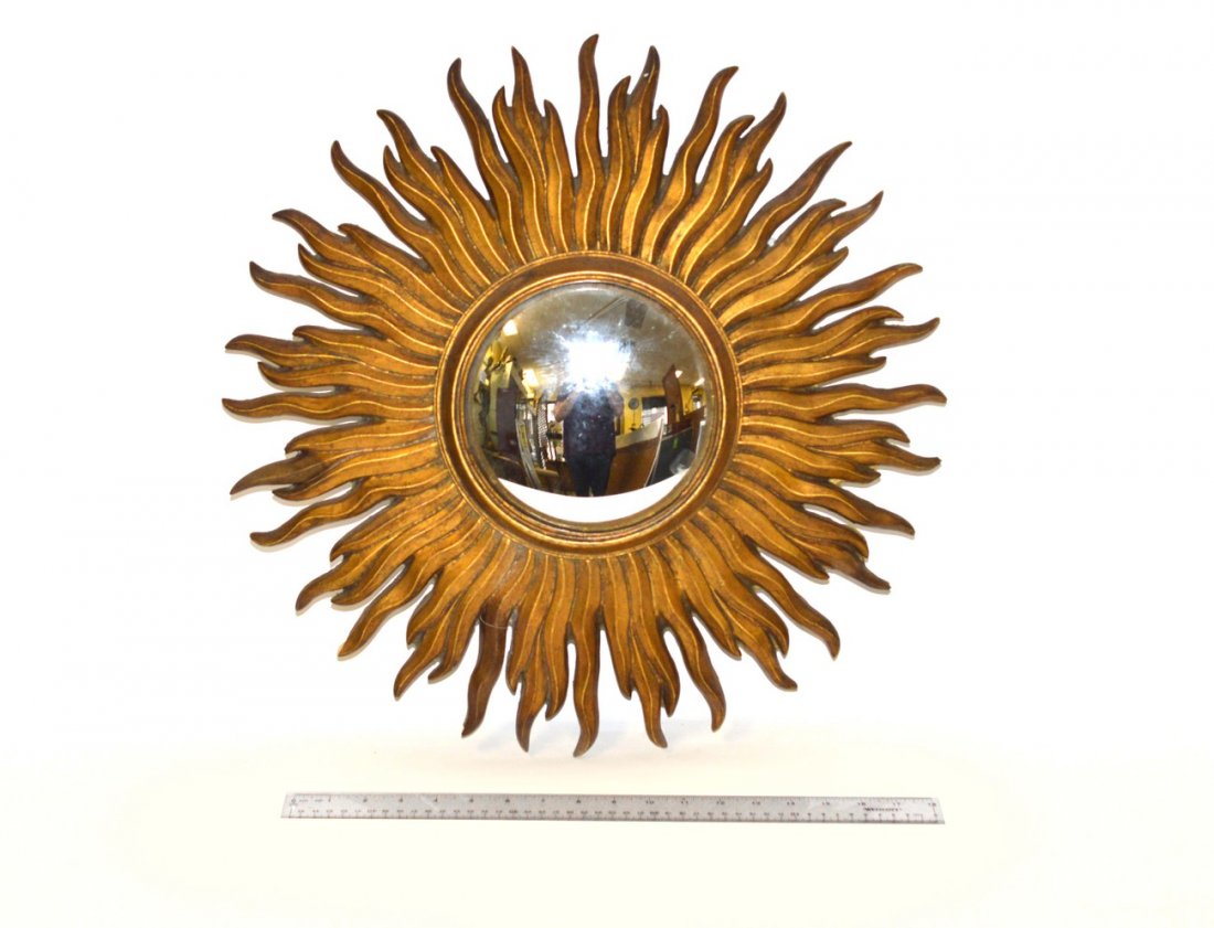 Mid-Century Gilt Sunburst Mirror: Convex mirror with surround composed of multiple undulating rays. 20" Dia x 2" D.