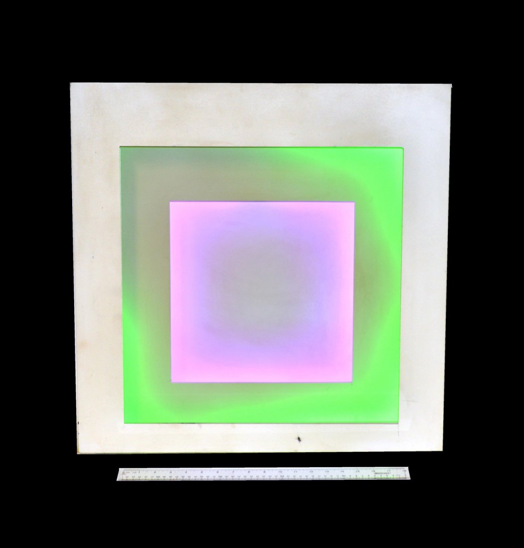 Flavin Style Fluorescent Light Sculpture: White powder coated aluminum sculpture composed of two squares, outer back-lit with recessed green fluorescent, and inner with purple fluorescent light. Overall: 24" sq x 4" D. Minor chips at edges. N