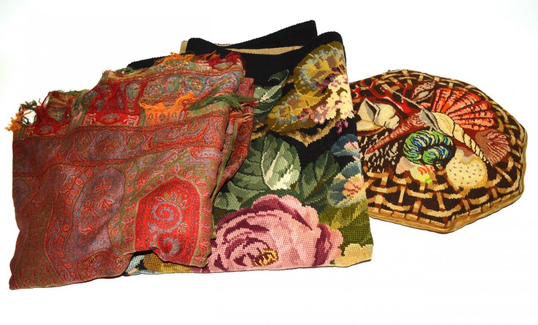 Decorative Textile Lot: Comprises: M.L. Kiekeben signed needlepoint rug [42" x 64"] with rose cabbage decor; vintage paisley throw [64" x 134"], and an octagonal needlepoint pillow [17" Dia] with seashell decor. Few snags, o