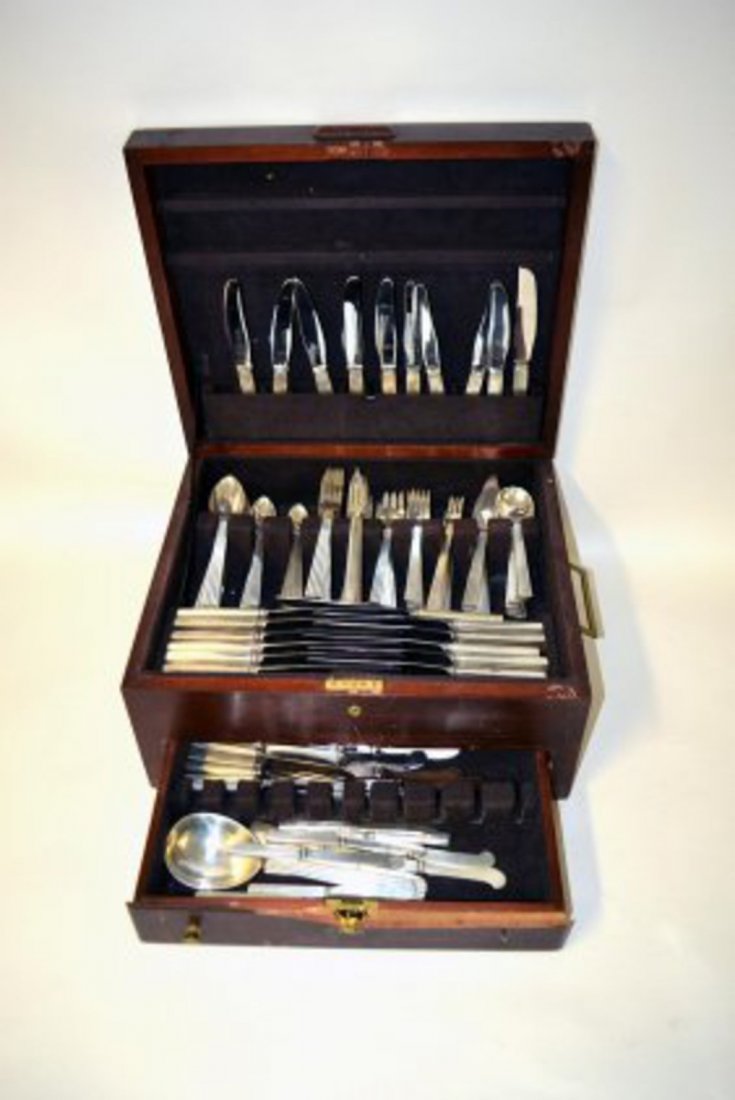 Georg Jensen Sterling Silver Flatware Service: Comprehensive sterling dinner service for 12+ in the Bernadotte pattern. Weighable: 263.17 ozt. Comprises: 36 dinner knives, 12 sterling silver butter knives [12.33], 7 sterling silver and stainless k