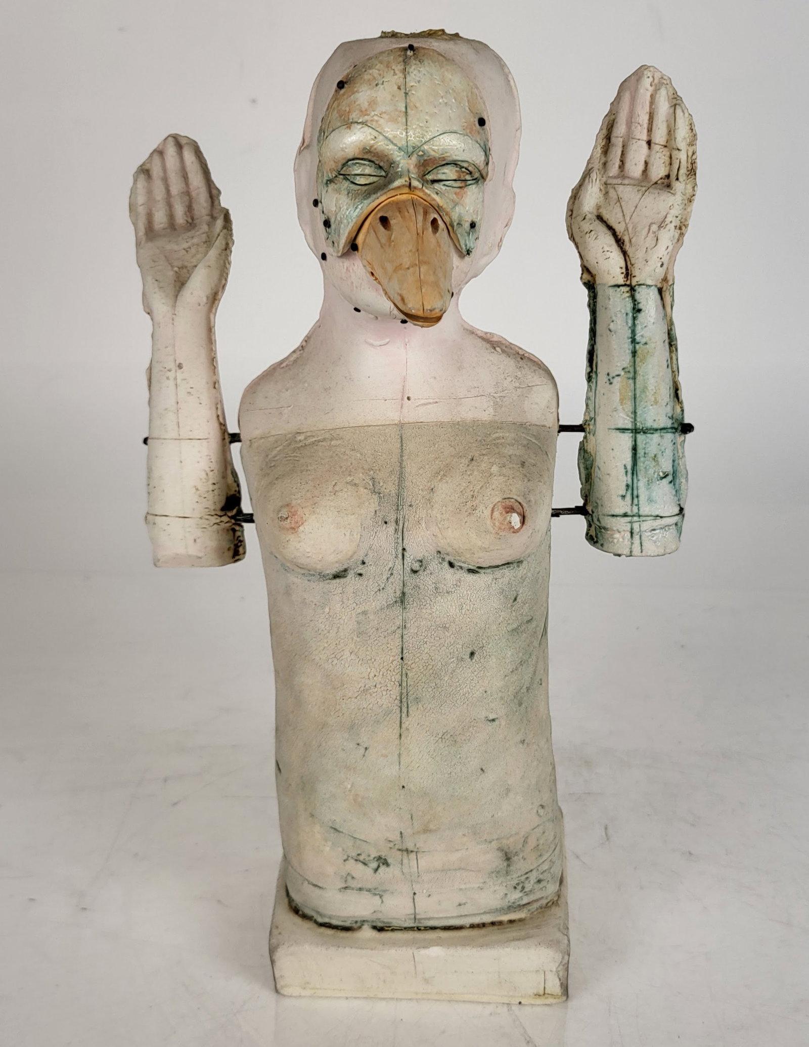 Woman with Duck Mask Signed Sculpture: Woman with duck mask sculpture, signed "E. Calque". Provenance: From the Collection of Brendelle & Fred Walden. [11" H x 6" W x 3" D]. Overall good condition. Condition reports and requests for additi