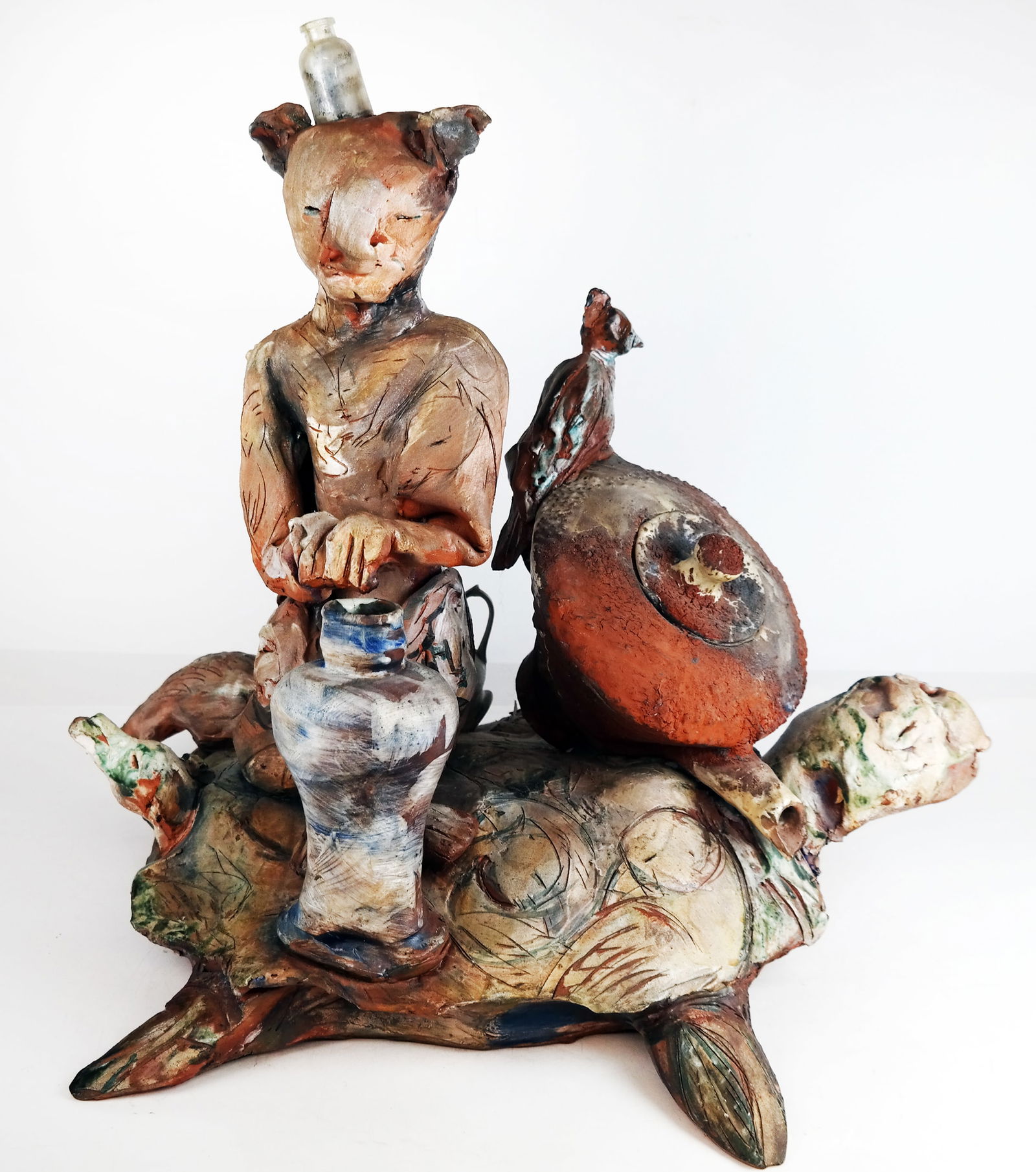 Abstract Ceramic Sculpture of Figures Atop Turtle (1 of 17)