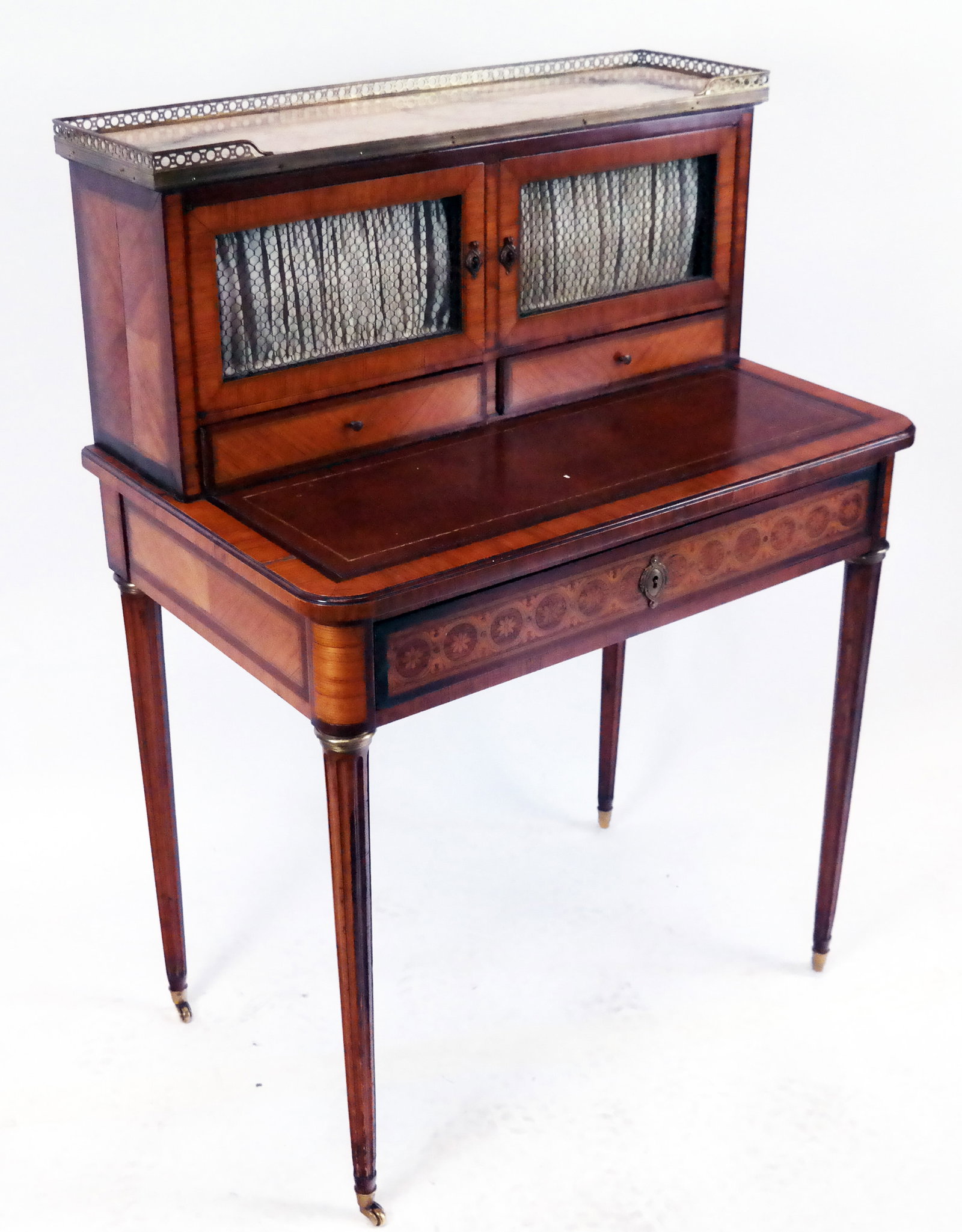Louis XVI French Bonhuer Du Jour: Louis XVI-style bonheur du jour, 19th century, French, the lady's writing desk with pierced gallery and marble top over a pair of cupboard doors, with a tooled leather writing pad and laid drawers, ra