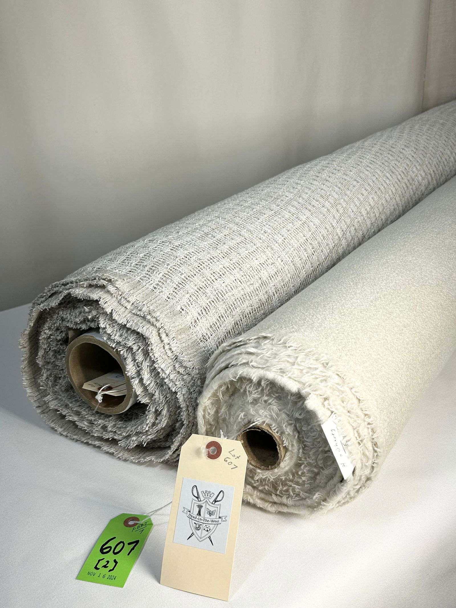 Holland & Sherry Wool & Complementary Sheer Fabric: 1) 7 1/2 yards of Holland & Sherry's "Brunswick" boiled wool in beige, # DE 13286, 55" width. In great condition. Two lengths on one tube: 2 1/2 yards plus 5 yards. 2) 11 yards of double-wide novelty