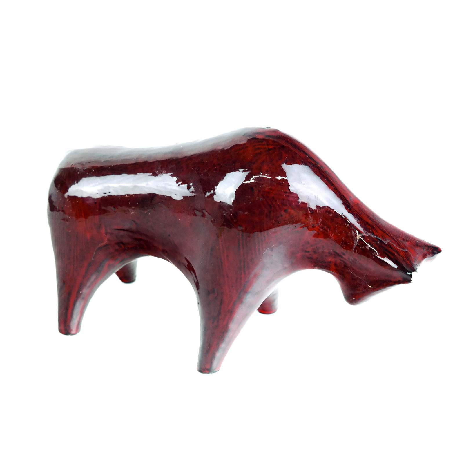 Alvino Bagni Bull, Circa 1960: Ceramic bull sculpture by Alvino Bagni for Raymor, circa 1960. [7" H x 12" W x 4" D]. Repair and glaze chipping to left horn. Condition reports and requests for additional photos cannot be accepted on