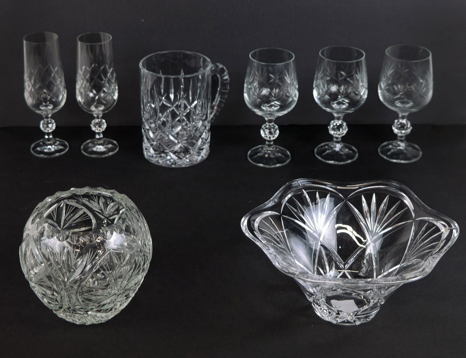 Group of Crystal Stemware - Serveware (8): Mixed group of cut crystal serveware, including Waterford (marked) Marquis Collection bowl, Reidel Nactmann lager mug (marked), three Bohemia crystal goblets, two Bohemia cut crystal flutes and a cut