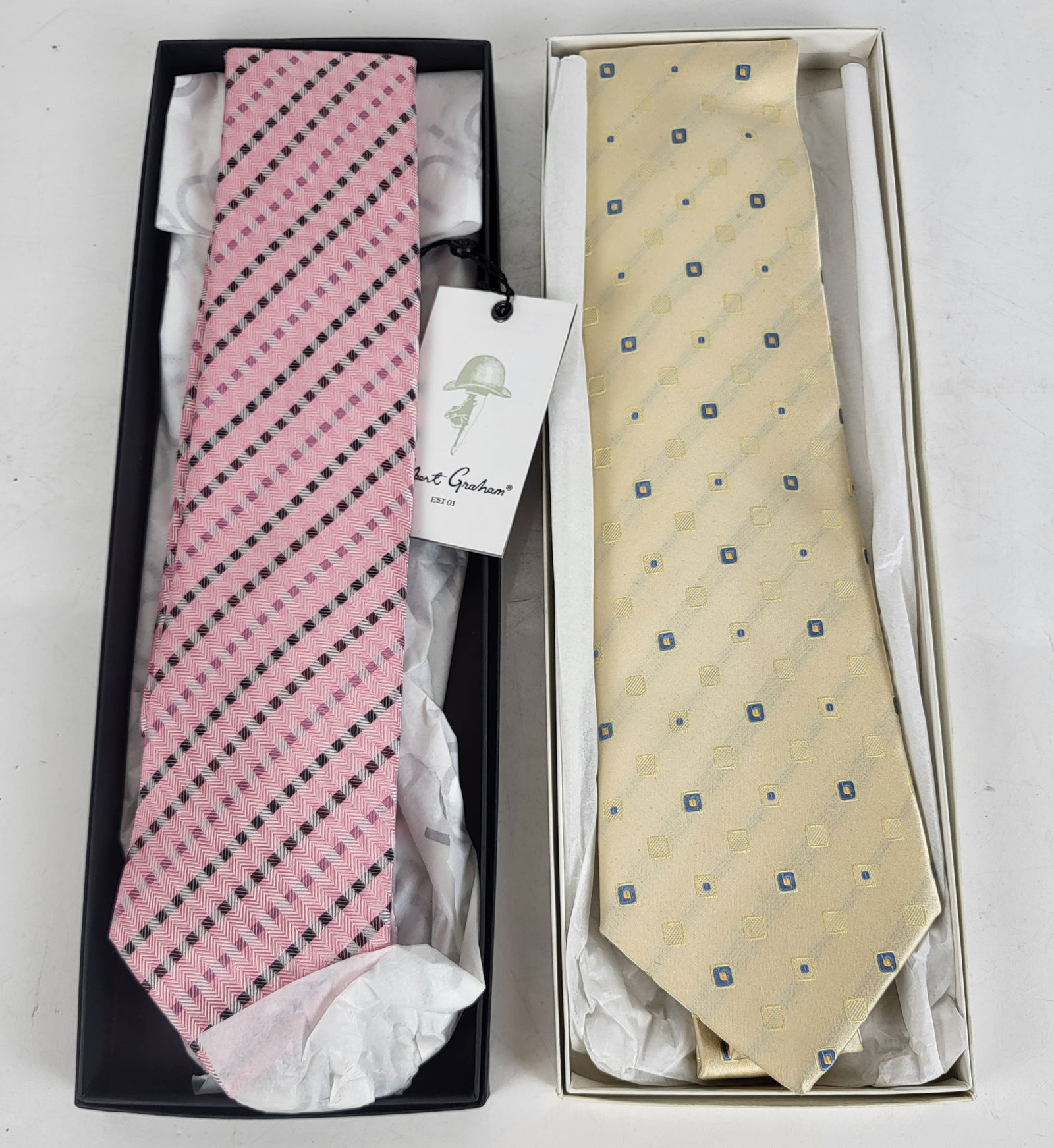 Two Men's Silk Ties: Two (2) men's silk ties, by Lancetti and Robert Graham. Condition reports and requests for additional photos cannot be accepted on this lot; please bid accordingly. This is not an indication of good o