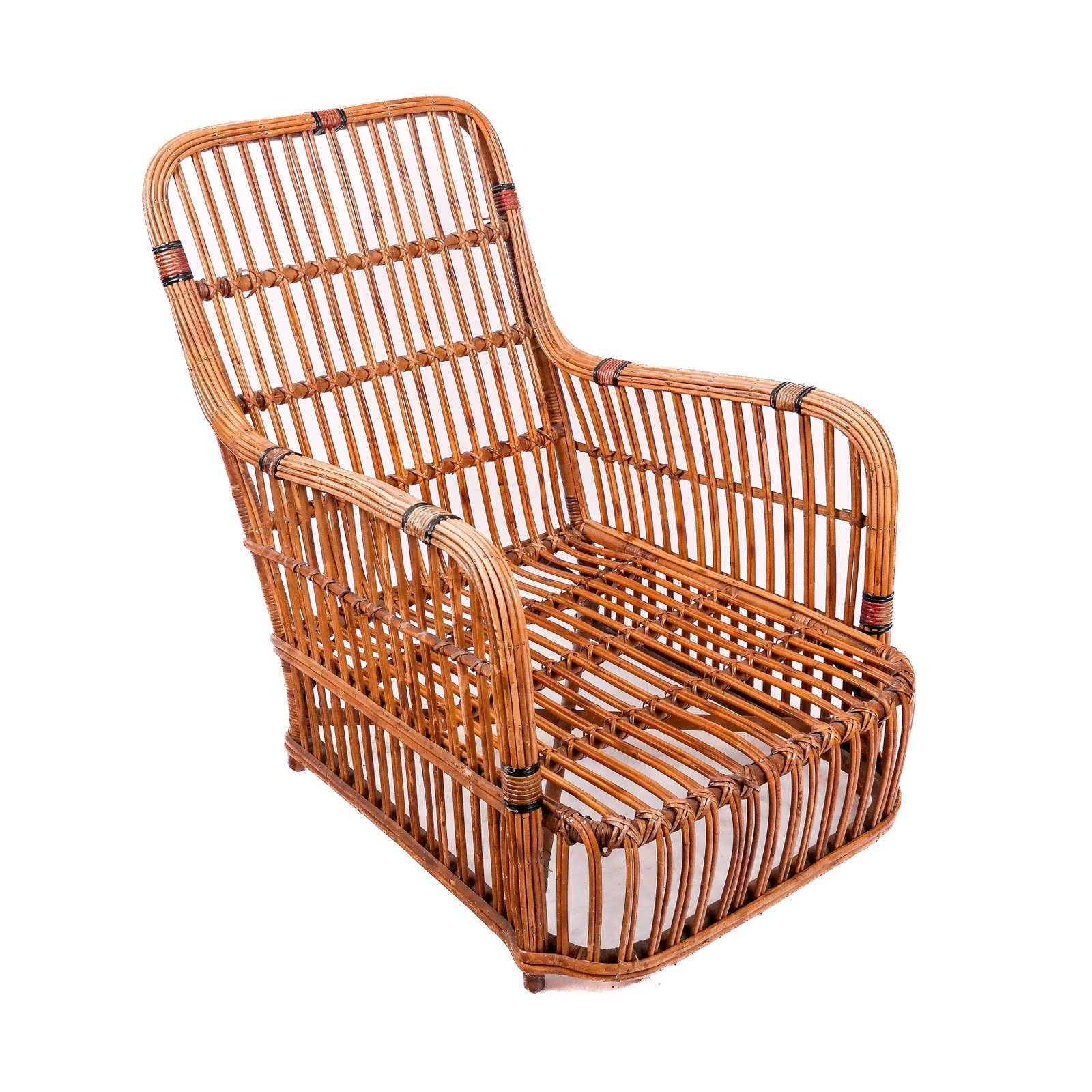 Art Deco Rattan Lounge Chair: American rattan club chair with banded accents. [34" H x 25 1/2" W x 36" D]. Surface wear commensurate with age; sold "as-is". Condition reports and requests for additional photos cannot be accepted o