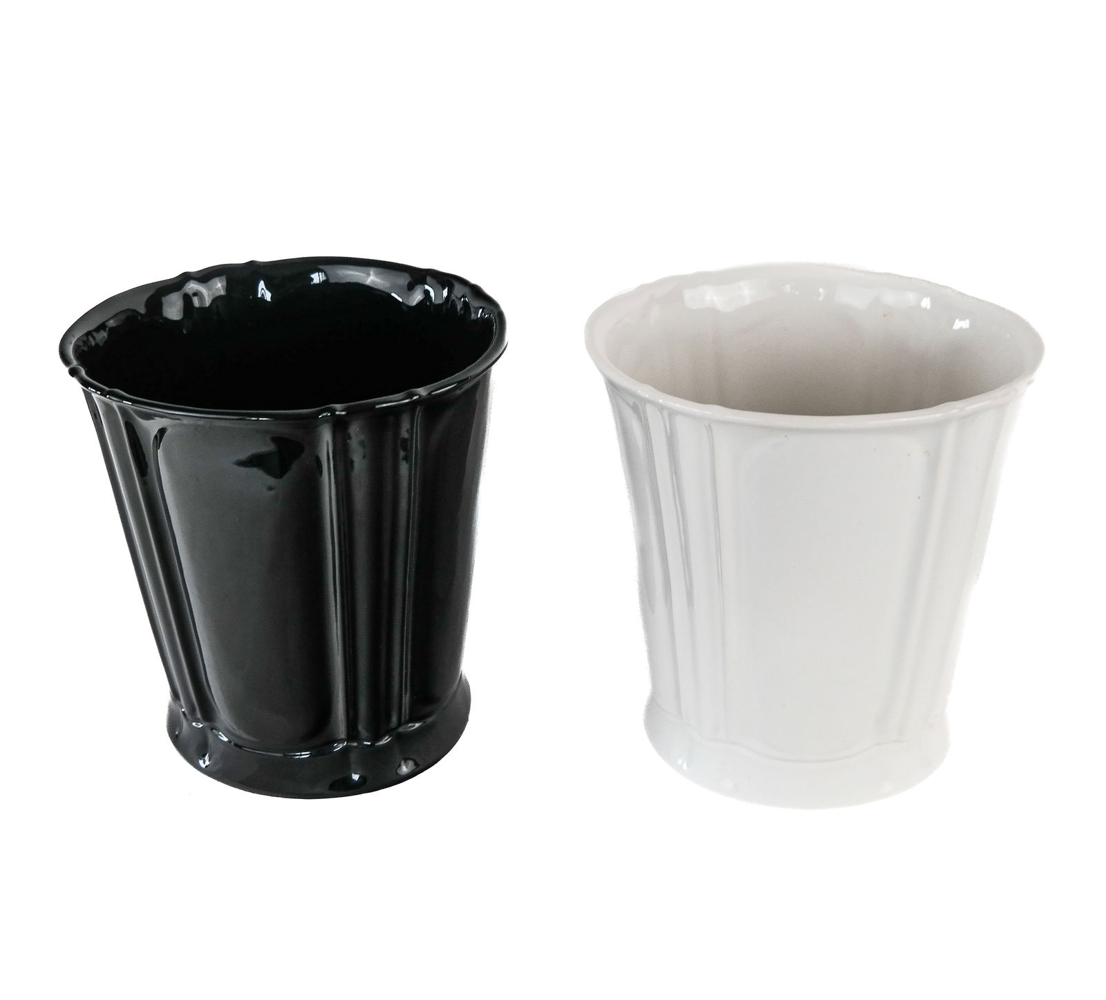 Two Sherle Wagner Porcelain Baskets: Two 20th century Sherle Wagner porcelain baskets in white and black, Italy. [12" H x 11" W x 10.5" D]. Overall good condition. property of an important NY philanthropic family. Condition reports and r