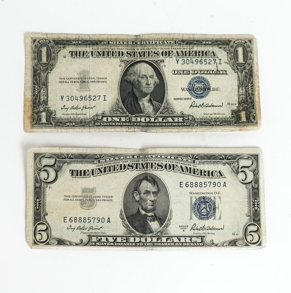 Two U.S. Silver Certificates: Two U.S. Silver Certificates, including a $5, blue seal, 1953A, in fair condition, and a $1, blue seal, 1935F, in fair condition and stained. Condition reports and requests for additional photos canno