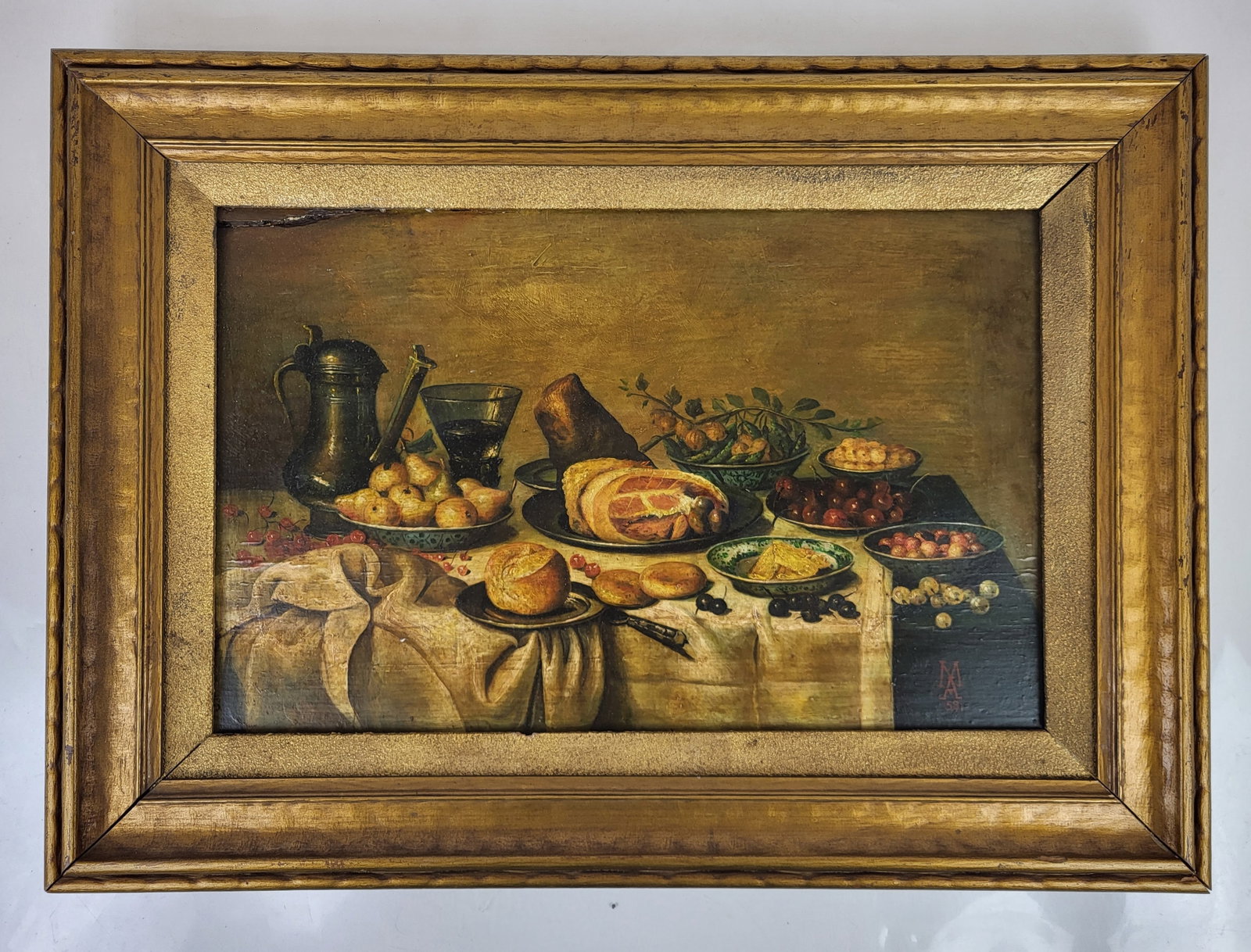 Mid-Century Still Life of Banquet Oil Painting: Vintage framed 1959 oil painting on artist's boards, depicting a still life of a banquet of fruit, meat, bread, cheese, wine and grapes; monogrammed "M.A." ("M" over "A") and dated in red. [Art: 9 3/4