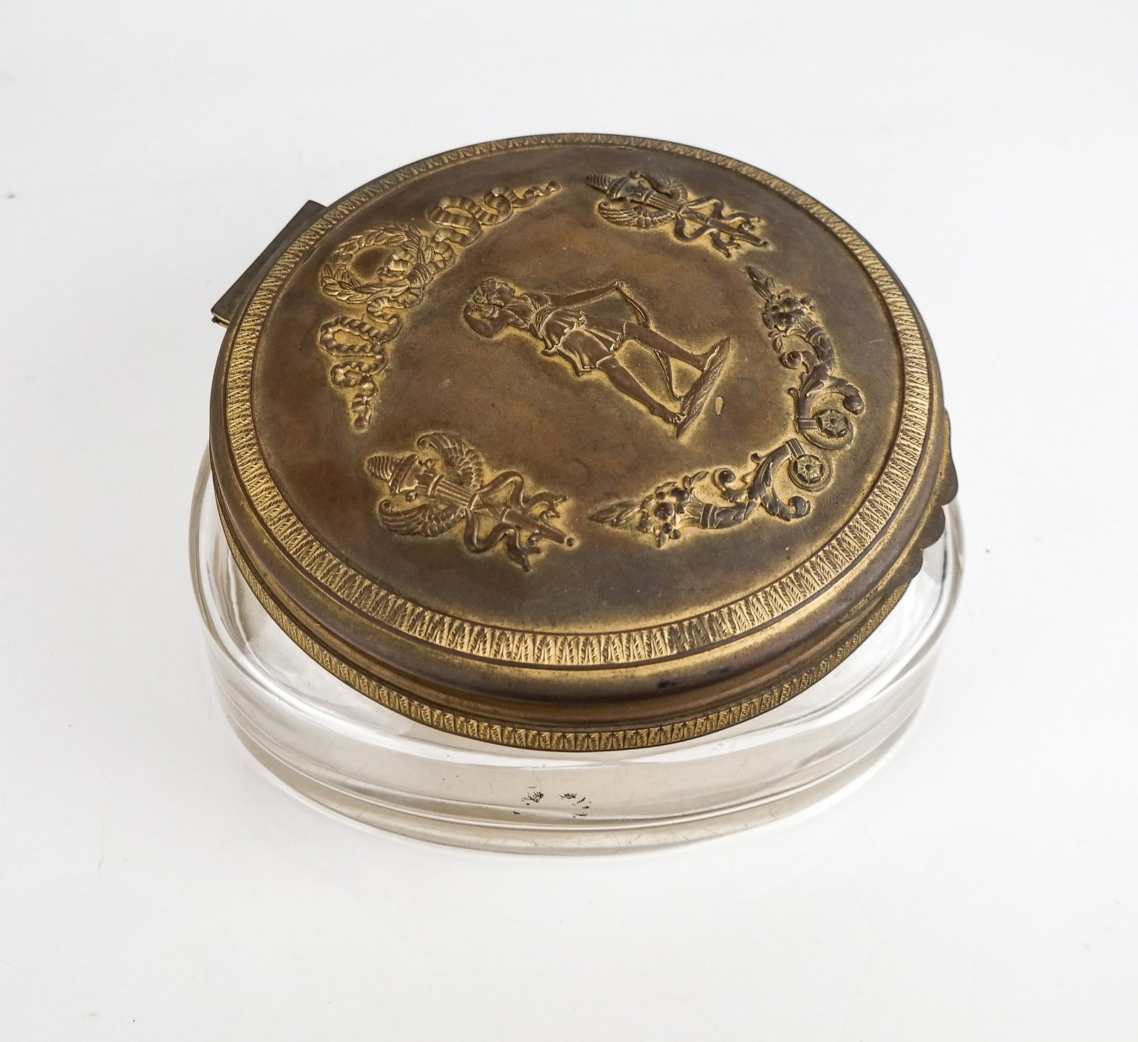 Large Gilt Bronze and Crystal Box: Large gilt bronze and crystal box in a rounded triangle shape with a hinged lid. [4.5" H x 9" W x 9" D]. Overall good condition with wear to gilding commensurate with age and some scratches to base. C