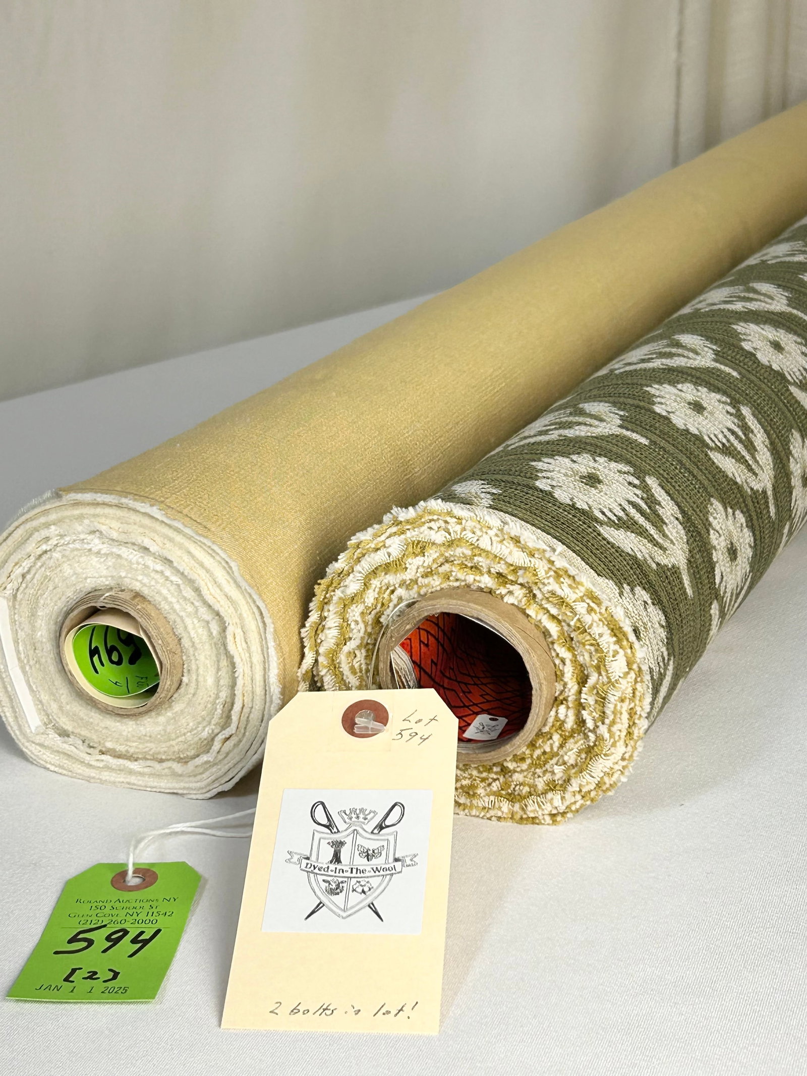 Claremont's Jacquard & Companion Twill Fabrics: 1) 6 1/2 yards of Claremont's "Toile Floraison" in off-white flowers on green and black background, 49 1/2" width. The cotton-blended upholstery has a 4" vertical repeat by 4 1/4" horizontal repeat. I