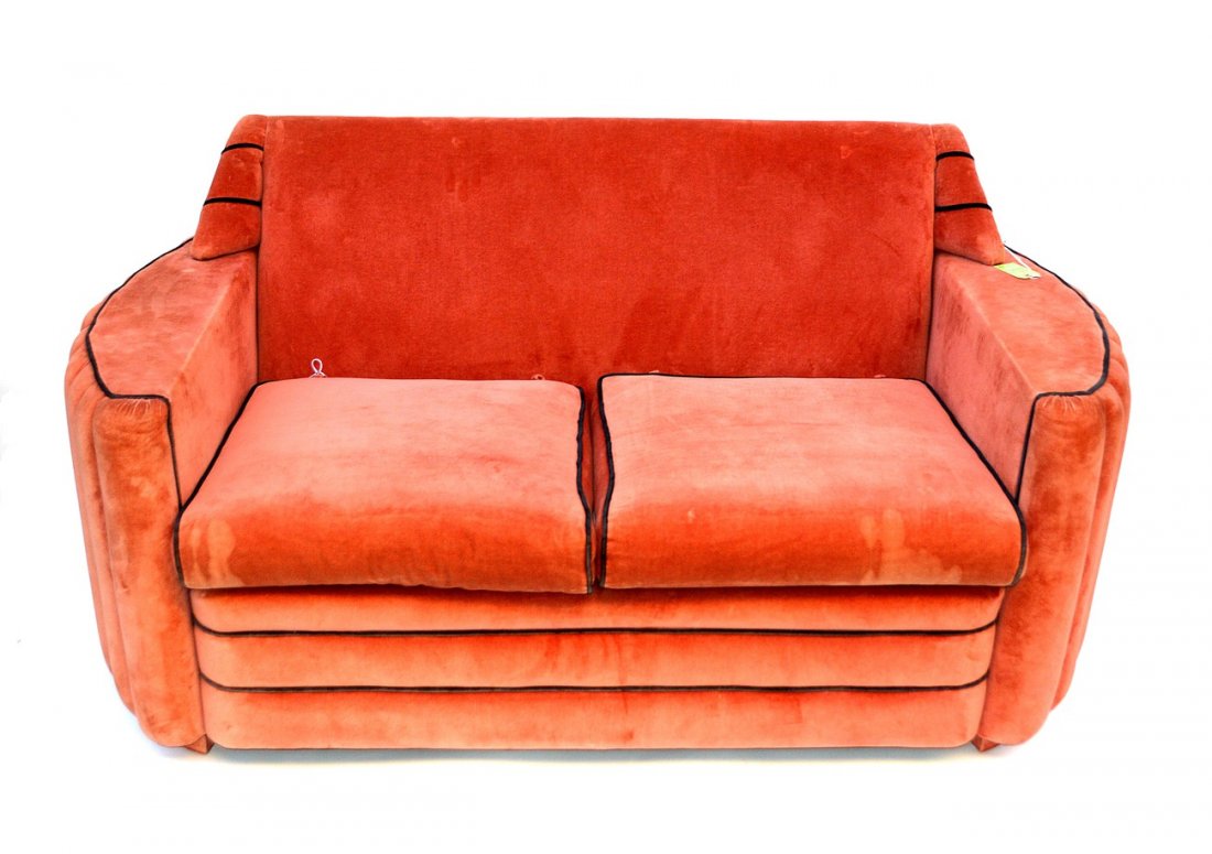 Art Deco Coral Upholstered Settee: Art Deco settee having coral velvet upholstery and black piping. 64" W x 34" D x 31 1/4" H. Upholstery signed.