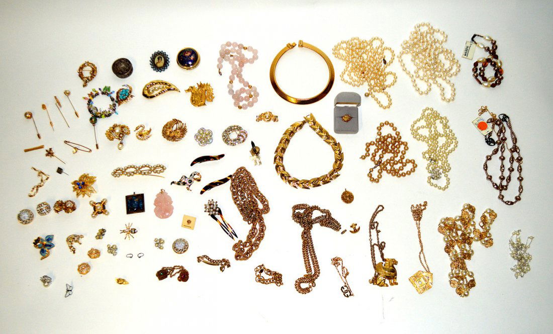 Assorted Costume Jewelry: Includes: necklaces, bracelets, pendants, pins, brooches, and others. Includes: paste stones, faux pearl, enamel, rose quartz, and others. 50+ items.