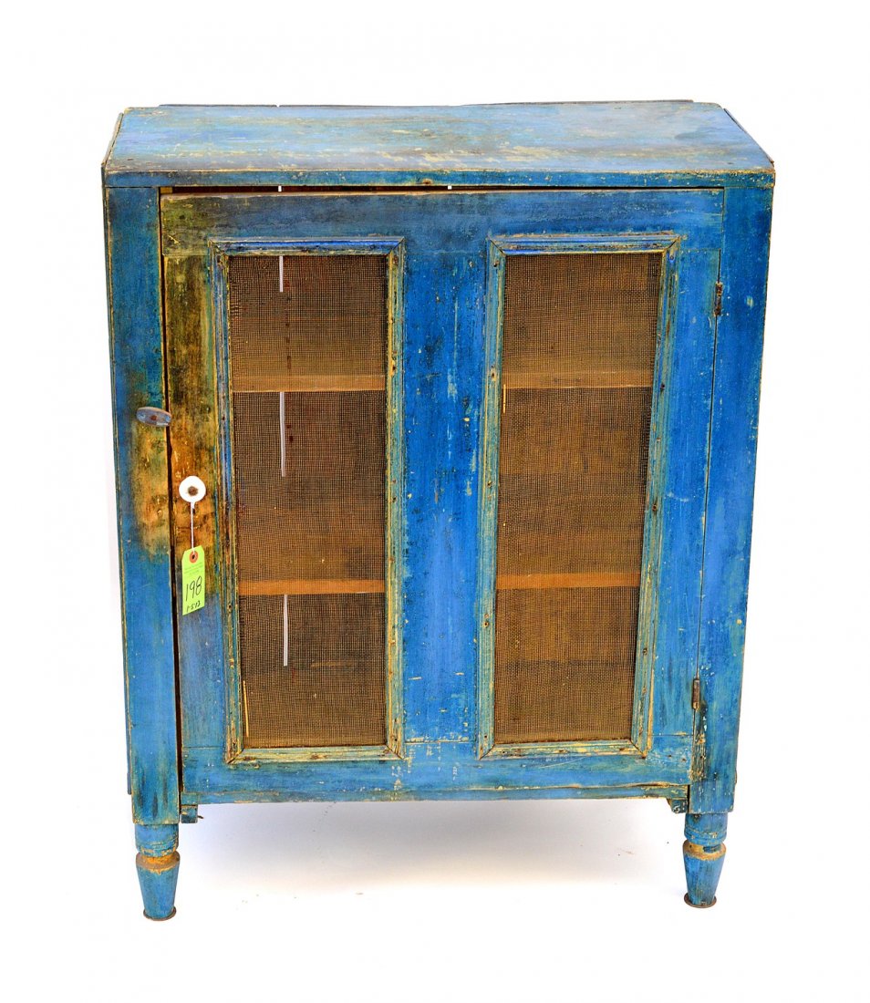 Primitive Pie Safe: Antique, with original blue paint, one door with mesh form inset panels. 31 1/2" L x 16" D x 40 3/4" H.