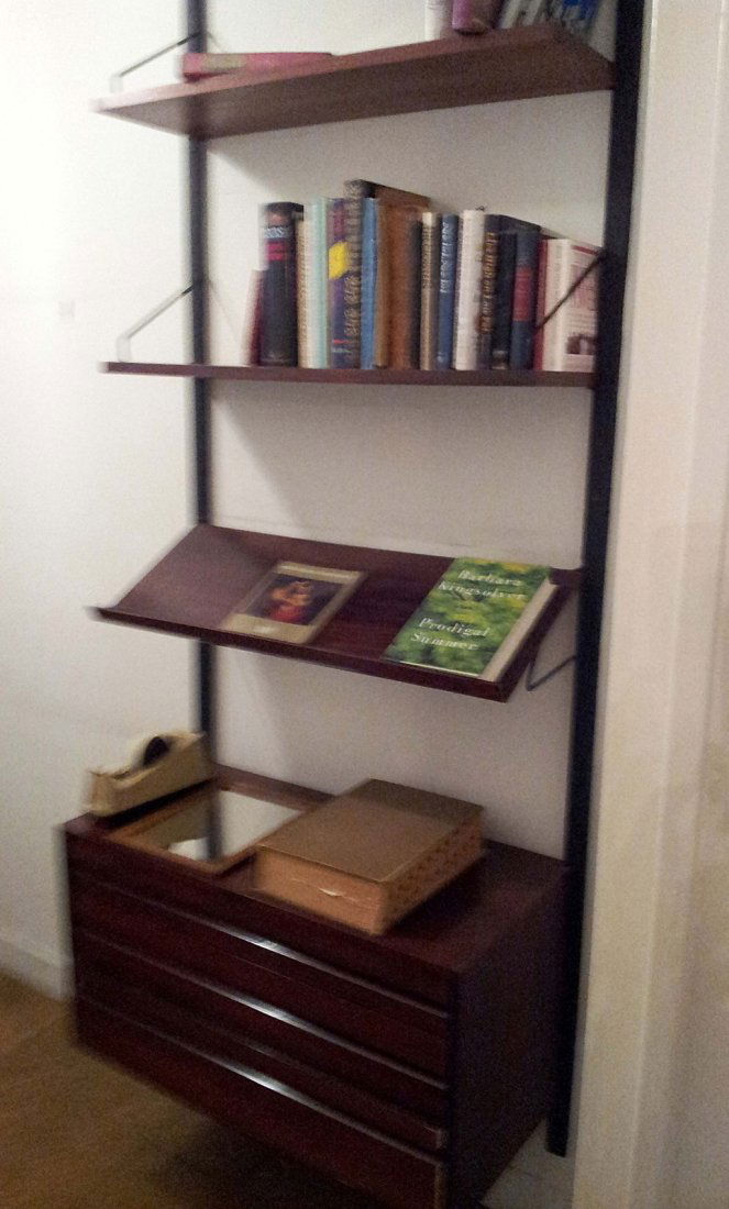 Riis Antonsen Style Wall Unit: Two lower chests. The upper section with two drawers. The lower with two sliding doors, each with three shelves. Together with a slant shelf.