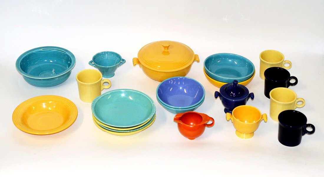 Assorted Fiestaware and Others: Fiestaware comprises: seven soup bowls, two serving dishes [one with cover], three sugar bowls [one with cover], two cereal bowls, five mugs, and [unmarked] creamer. Some chips and crazing.