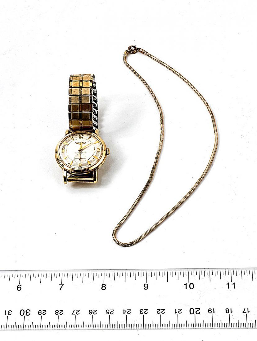 Gold-Filled Longines Watch and Necklace: Comprises a 10k gold-filled Longines wrist watch with expandable band and a 12k gold filled chain necklace.