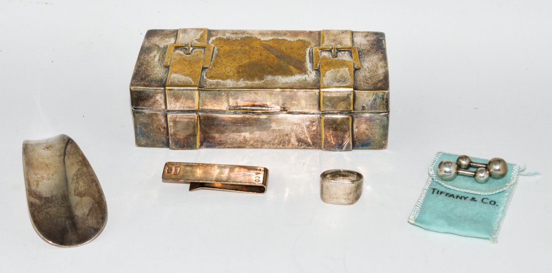 Assorted Sterling Silver Tiffany Articles & Other: Comprises: a pair of Tiffany & Co. cufflinks, Tiffany & Co. money clip, shoe horn, and a men's ring. 3.16 ozt. Accompanied by a L'Ecuver silver- plated box. All items as is.