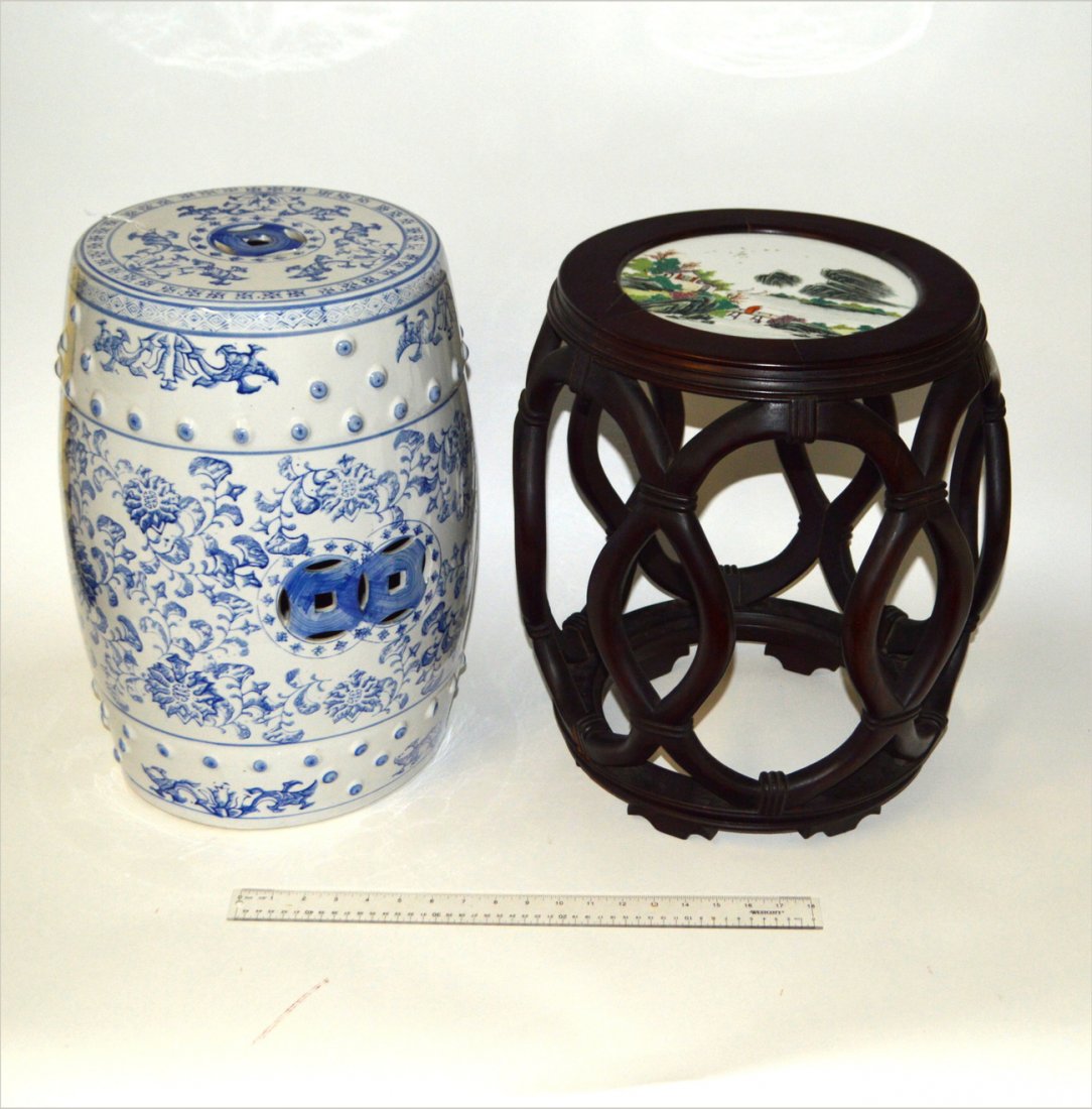 Two Asian Garden Seats: A porcelain blue and white garden seat, together with a wood and porcelain inset garden seat. 18 1/2"H x 13" dia (tallest).
