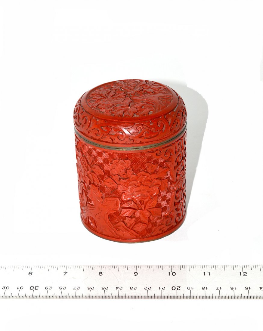 Chinese Cinnabar Jar: Red carved covered jar, blue enamel interior. 4"H x 3" dia.