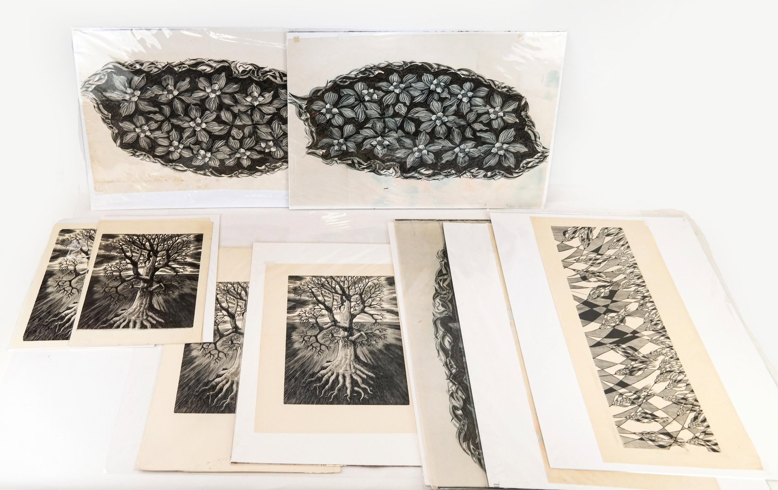 Hans JELINEK: Flora - 14 Woodcuts & Engravings: Hans Jelinek (Austrian/American, 1910-1992), 14 woodcuts and engravings depicting stylized wheat, trees and flowers, several are pencil signed at lower margin. Provenance: From the Estate of Hans Jeli