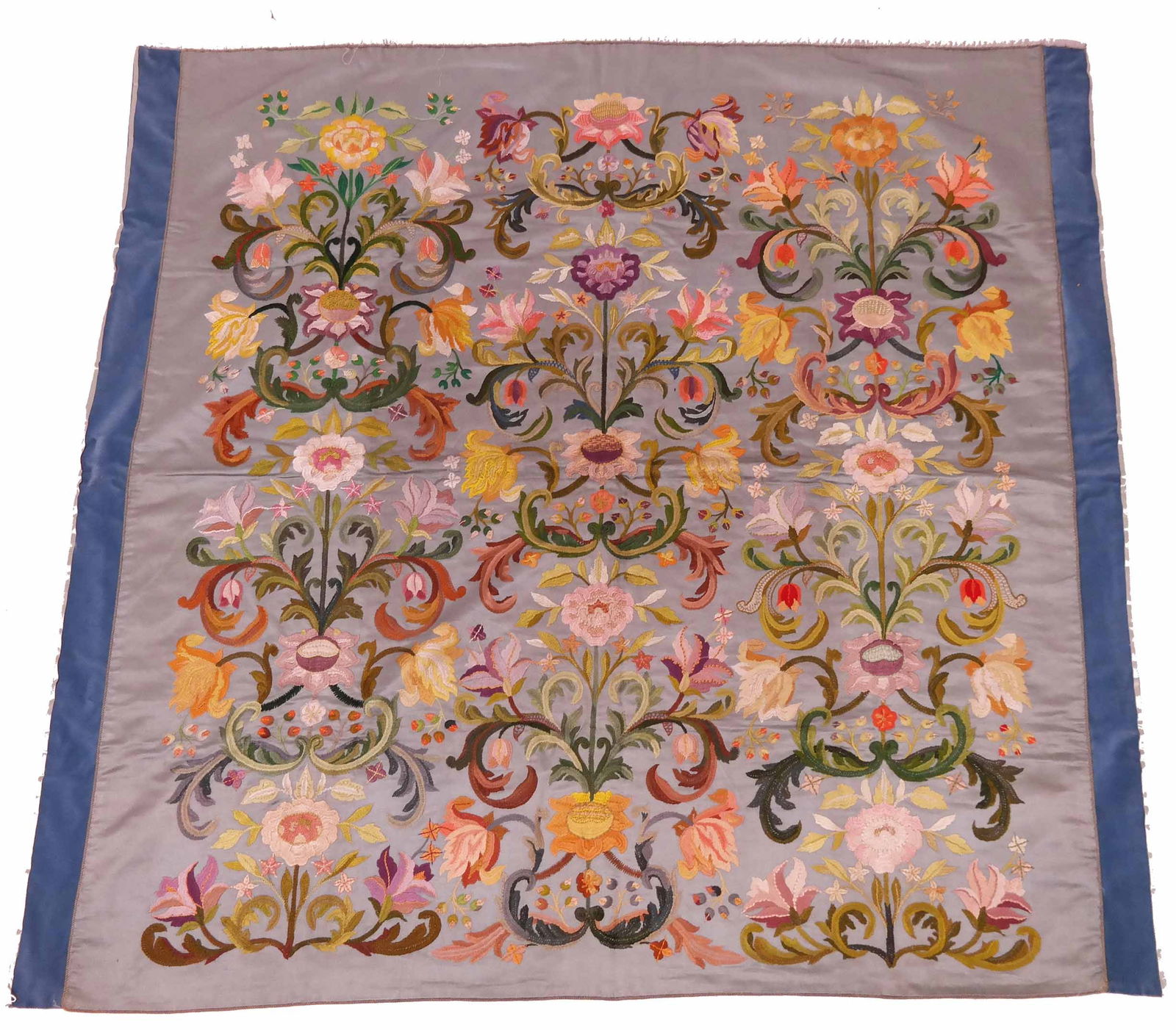 Silk Arts and Crafts Embroidery, ca. 1900: Silk embroidered panel of the Arts and Crafts period, with a dense design of flowers in a rainbow of silk threads and worked with many types of stitches, including stem, herringbone, and long-and-shor