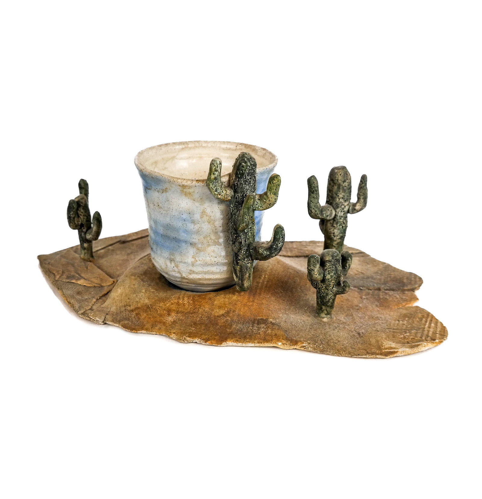 Two Part Glazed Ceramic Desert Sculpture: Two part glazed ceramic desert sculpture. Unsigned. Provenance: From the Collection of Brendelle & Fred Walden. [4 1/2" H; Base: 12" H x 7 1/2" W]. Overall good condition. Condition reports and reques