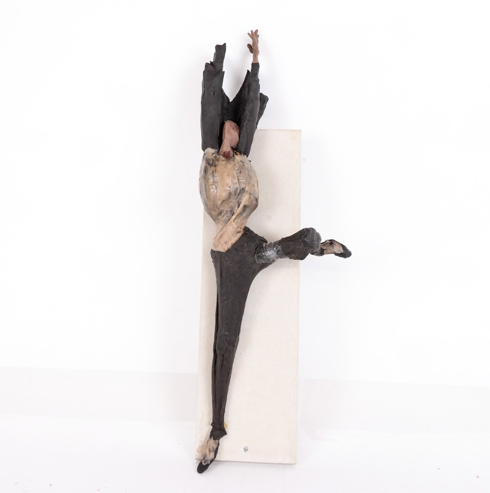 Ceramic Sculpture of a Dancer: A ceramic sculpture of an upside down figure. Provenance: From the Collection of Brendelle & Fred Walden. [15" H x 5" W]. One hand detached, and one broken leg otherwise good condition. Condition repo