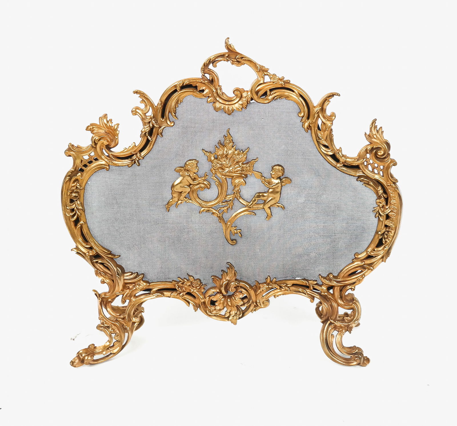 Louis XV Bronze Dore Fireplace Screen: Louis XV bronze dore fireplace screen, 20th century, of elaborate shield shape with "C" scrolls, centering cherubs stoking a fire with bellows [29" H x 29" W x 8" D] Overall condition is good, screen