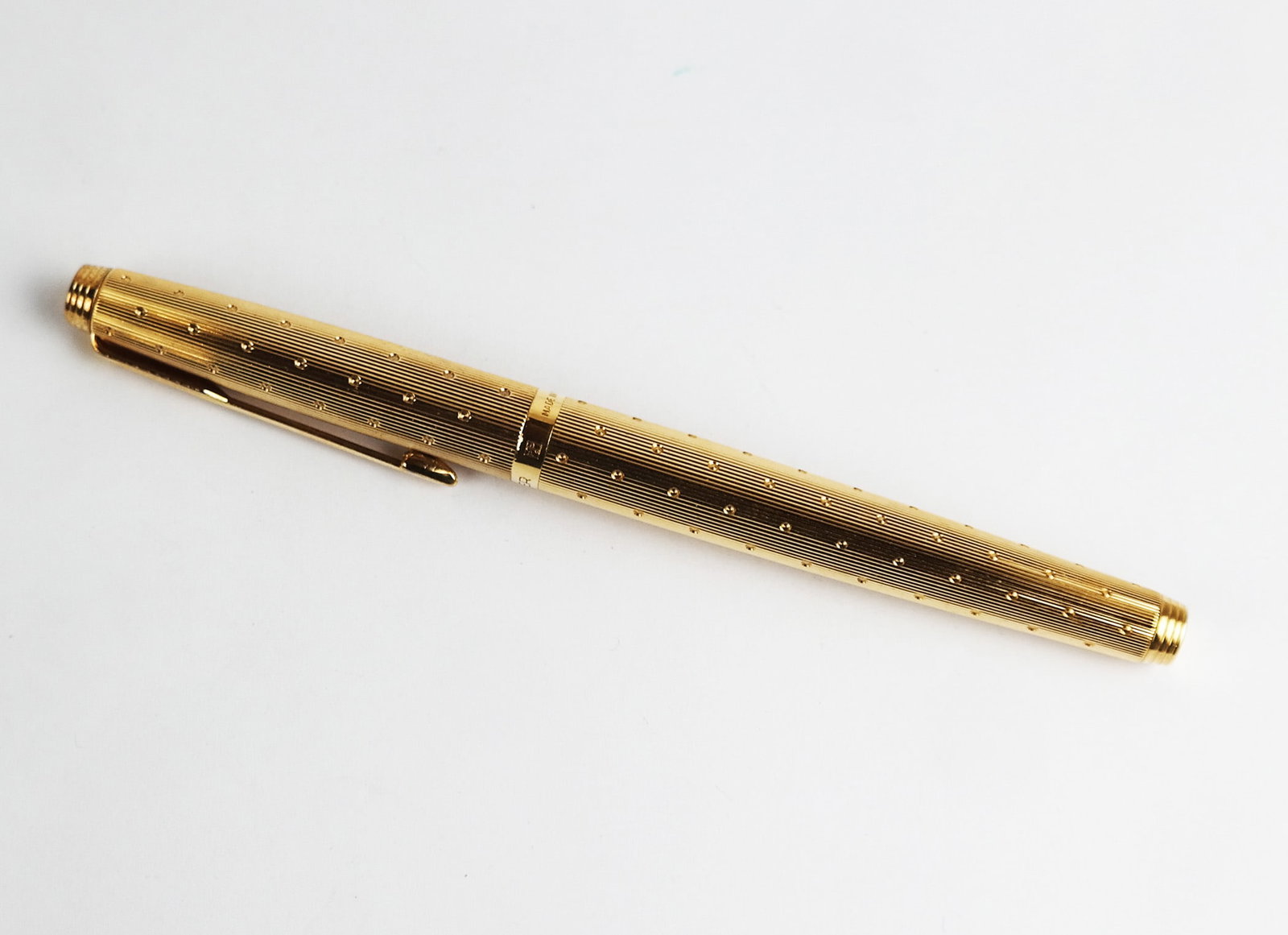 Parker 14K Nib Gold-Tone Pen: Parker gold-tone pen with a 14K gold nib.