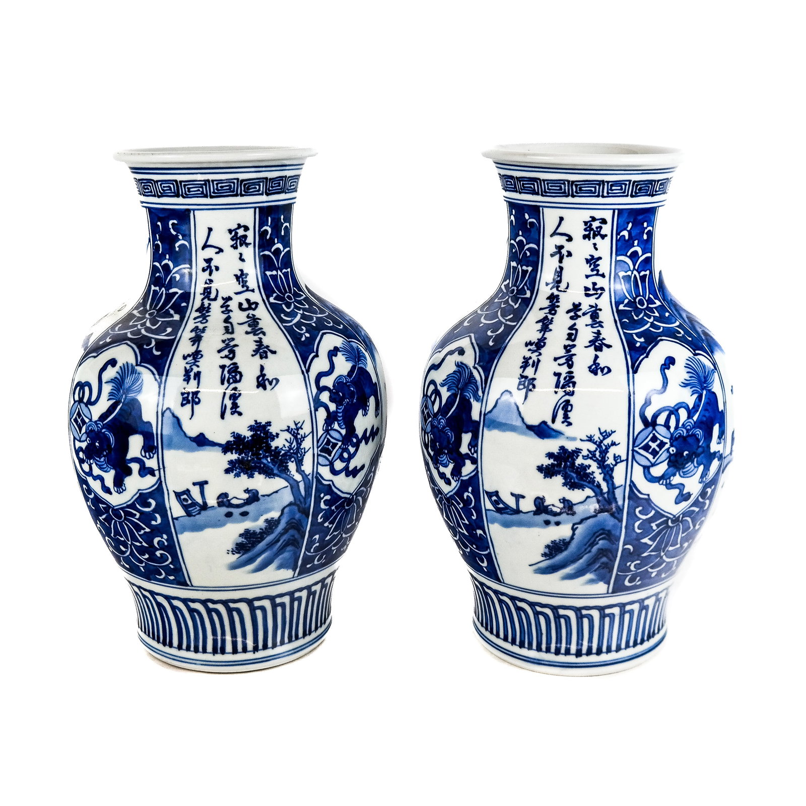 Pair of Chinese Blue & White Porcelain Vases: Pair of Chinese blue and white porcelain vases, overall with cartouches of scenic landscapes and "foo dog" temple lions, bearing blue character seal mark to base. [11 3/4" H x 8" Diam.]. Crackling to 
