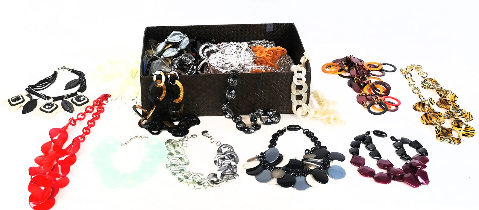 Max Mara, Pono & Others, Plastic & Acrylic Jewelry: Collection of plastic and acrylic jewelry comprising Max Mara necklace, Fiocchi necklace and necklace and earring set, Anka necklace, 2 Pongo link necklaces, 5 bracelets, Monet wedge necklace, 6 neckl