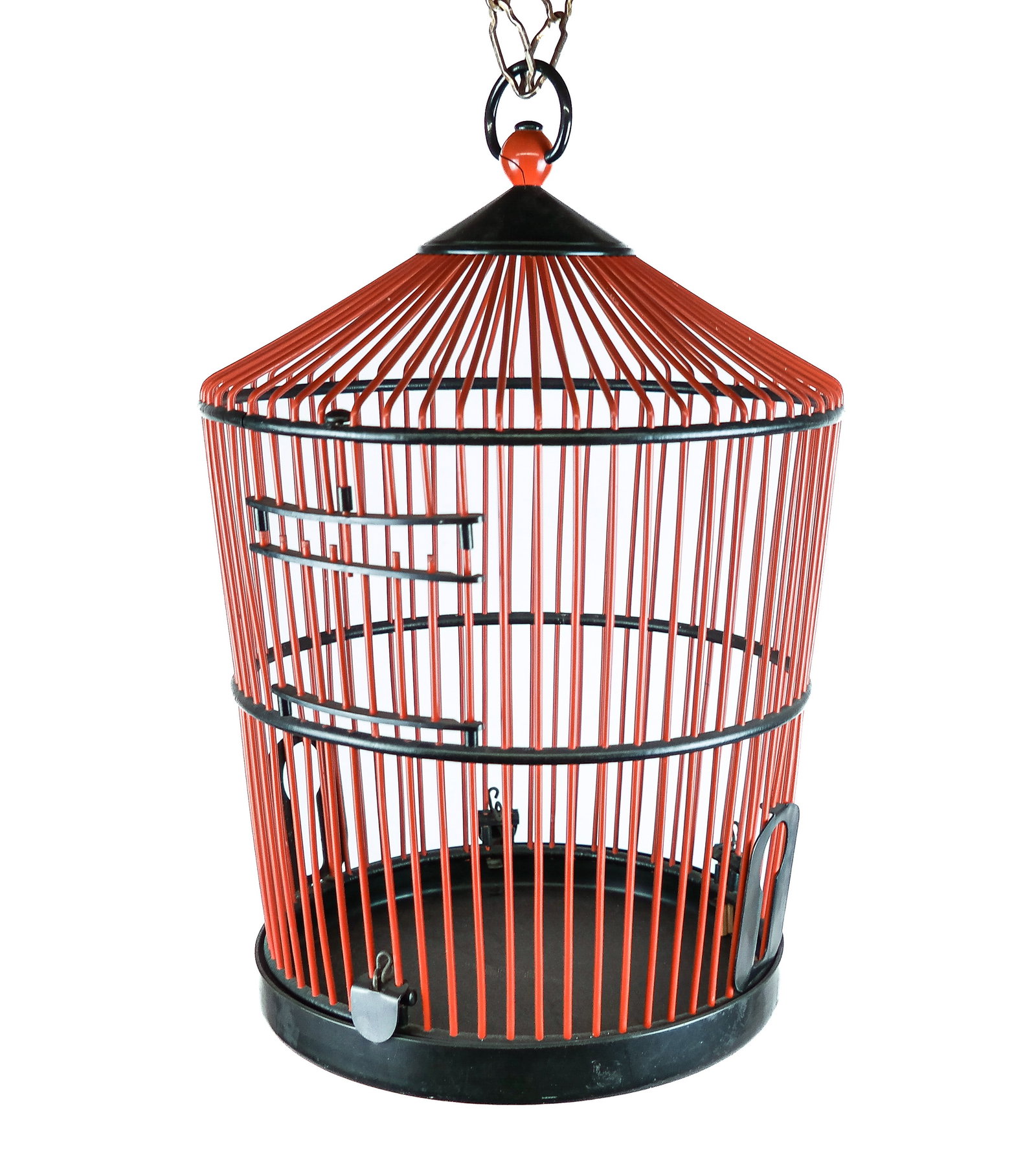 Chinese Red and Black Birdcage: Chinese red and black hanging bird cage made from faux cinnabar and faux black lacquered wood. [17" H x 11" Diameter]. Overall good condition with a crack to the finial at top.