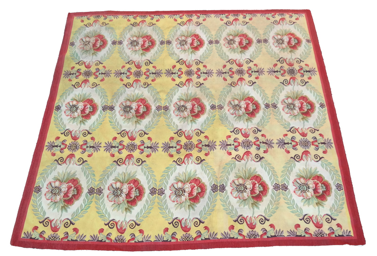 Aubusson Floral Rug: Aubusson floral rug. [79" x 78"]. In overall good condition. Condition reports and requests for additional photos cannot be accepted on this lot; please bid accordingly. This is not an indication of g