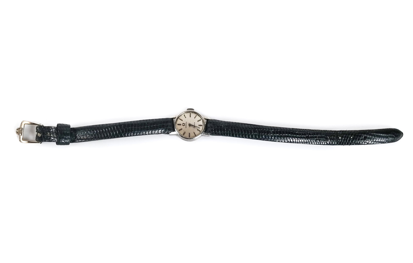 Omega White Gold Wristwatch Fragment: Omega 18K white gold wristwatch fragment, interior rear case marked, crystal deficient, in signed box, 7.2 dwt. inclusive of band and movement [.60" Diameter of face]. As is condition
