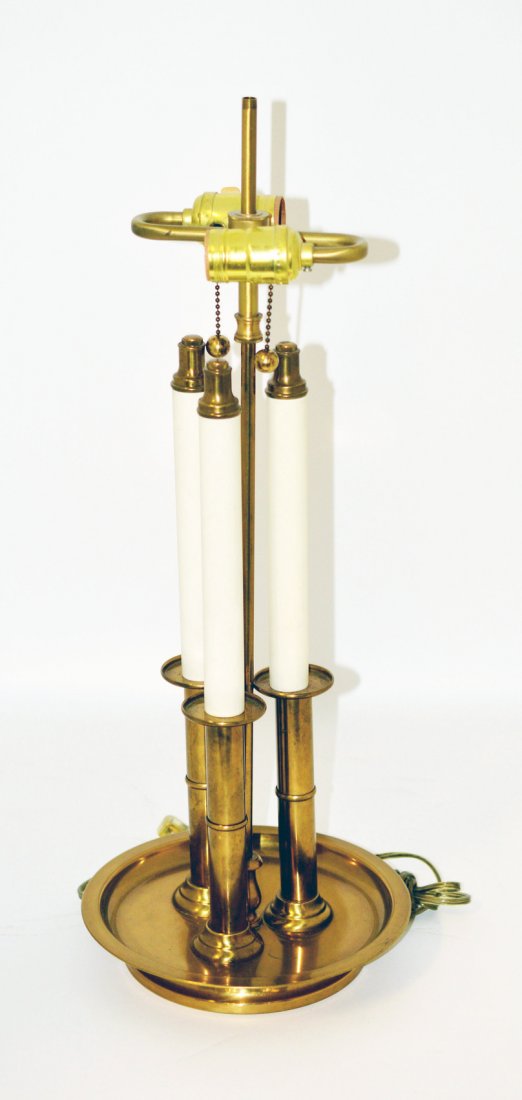 Bouillotte Lamp: Brass lamp with three candlesticks. Bears two edison base sockets. Missing shade. 9"DIA x 23"H. As is.