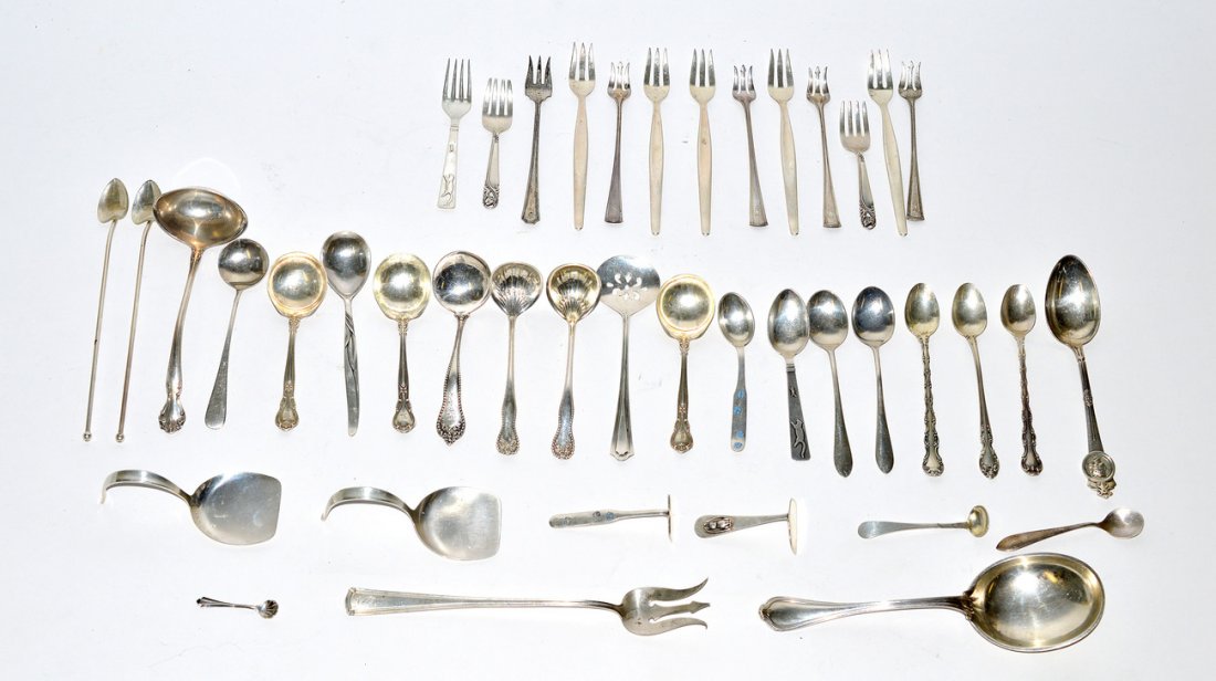 Assorted Sterling Silver Flatware: Comprises various flatware including serving articles, condiments, scrapers, specialized forks and spoons, etc. 30 ozt.