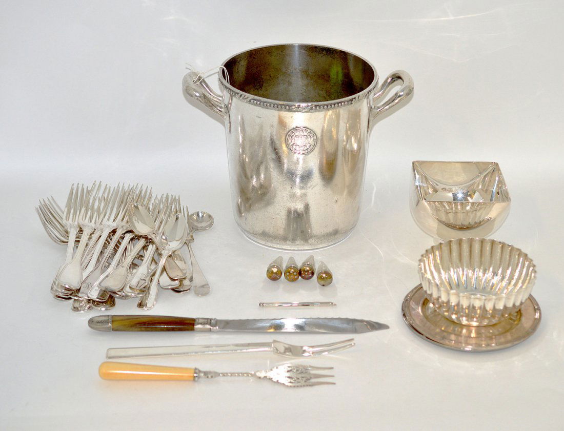Assorted European and Ocean Liner Articles: Comprises of 17 French dinner forks, 4 lunch forks, 4 dessert forks, 7 tea spoons, horn handle bread knife, 2 serving forks, two bowls and an iced tea spoon. Accompanied by a champagne bucket (stamped
