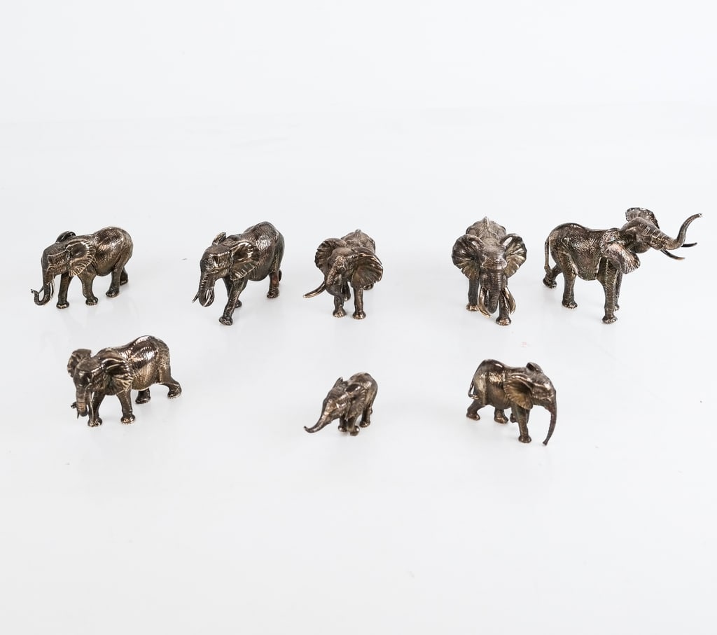Patrick Mavros Eight Sterling Silver Elephants: Patrick Mavros collection of eight sterling silver elephant figures, Zimbabwean, 1998, 1999, 2000 and 2006, marks to base [Largest: 2.5" H x 4" W x 2" D] 83.5 OZT. Overall condition is good, one tusk 