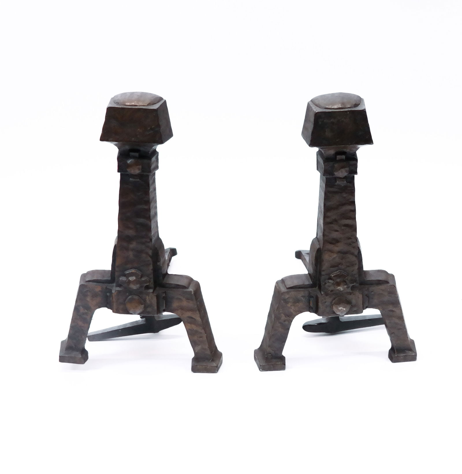 Pair of Arts & Crafts Andirons, 1860-1920: Pair of American bronze hand-hammered forged andirons. [18.5" H x 11.25" W x 22" D]. Condition reports and requests for additional photos cannot be accepted on this lot; please bid accordingly. This i