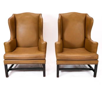 Two Faux Leather Wing Chairs