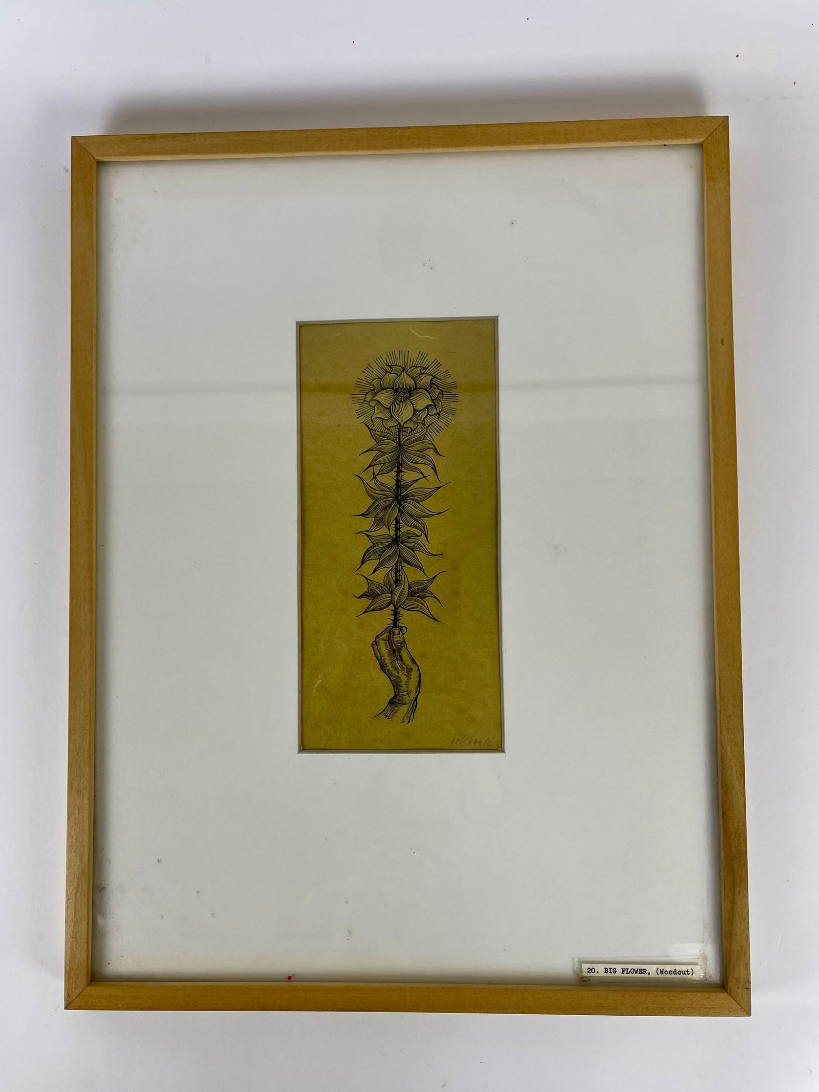 Hans JELINEK: "Big Flower" - Signed Woodcut Engrav: Hans Jelinek (Austrian/American, 1910-1992) woodcut on amber-colored wove paper of a hand holding a stylized flower, titled "Big Flower". Pencil signed lower right, matted and framed beneath glass. Pr